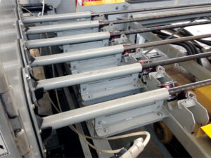 Six blasting lances in a pipe blaster system used for simultaneous internal abrasive cleaning of multiple pipes.