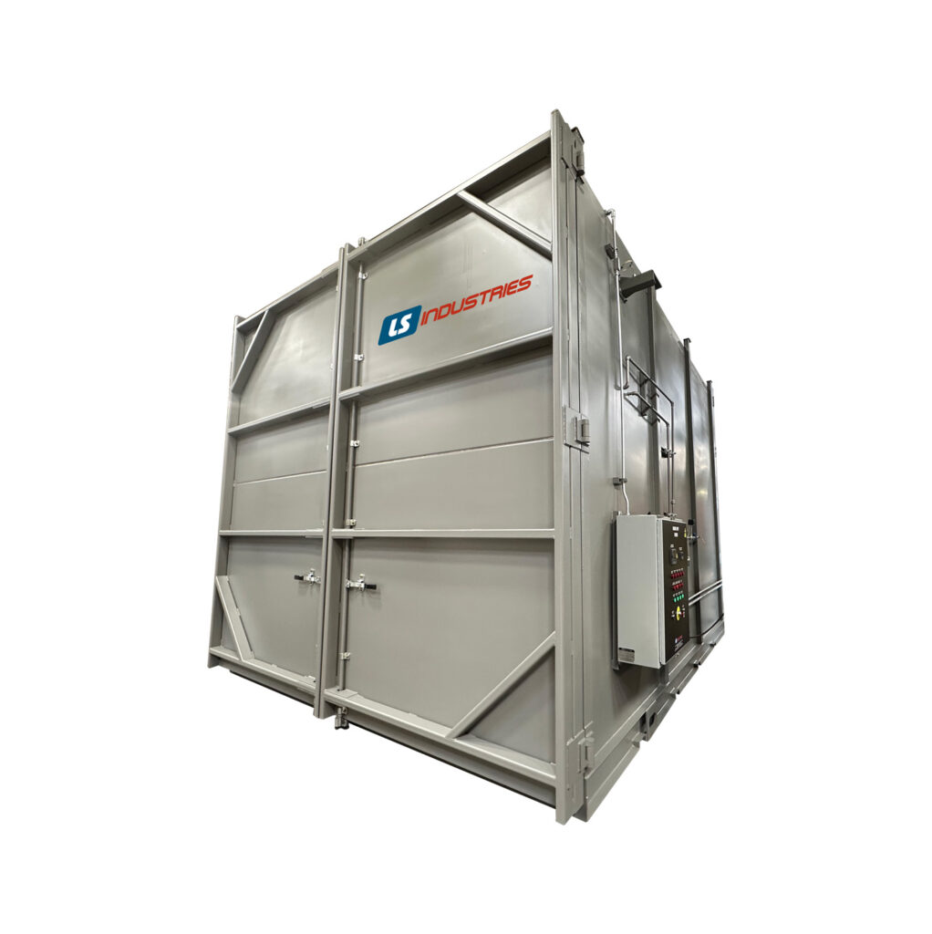 Angled view of an industrial burn-off oven used for thermal cleaning and removal of coatings, grease, and contaminants from metal parts.