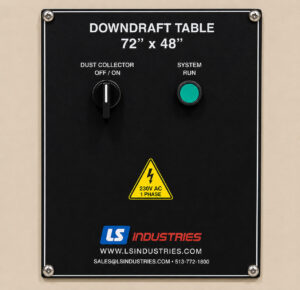 Control panel of a downdraft table dust collection system featuring power controls, system operation functions, and airflow monitoring components.