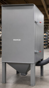 Dust collector connected to a rubber belt blaster designed to capture dust, abrasive fines, and contaminants generated during the blasting process.