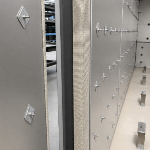 Close-up view of the insulated wall construction of a walk-in burn-off oven designed to retain heat, improve energy efficiency, and maintain consistent operating temperatures.