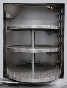 Optional removable parts trays for a small table washer designed to organize, secure, and separate components during the cleaning process.