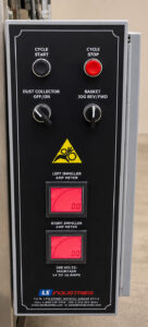 Control panel of a fixed basket blaster featuring machine controls, operating functions, and system monitoring for automated abrasive blasting operations.