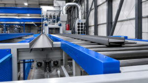Angled view of a transfer table automation and handling system designed to move parts between production stations with precision and efficiency.