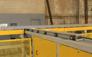 Close-up view of a transfer table used in industrial automation and material handling systems to move parts between process stations.