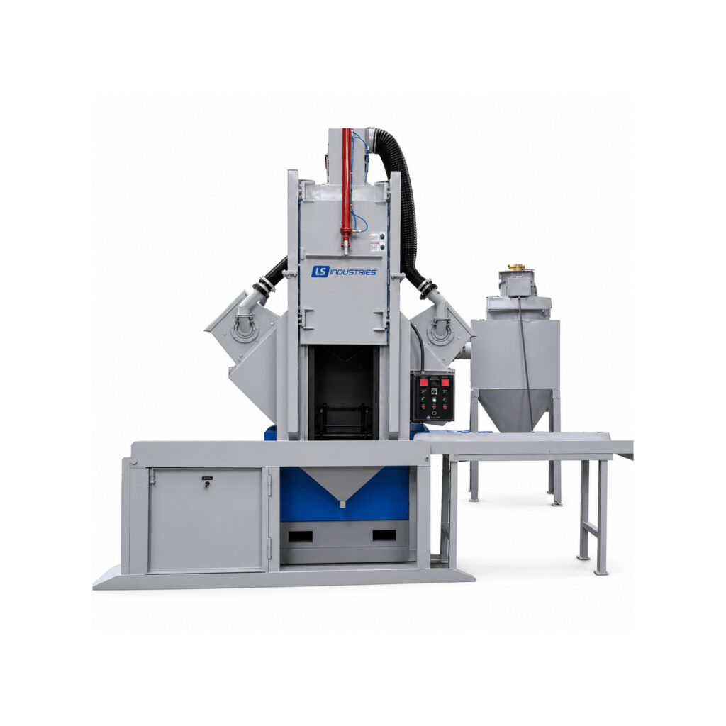 Angled view of a wheel rim blaster designed to clean and prepare steel wheels, rims, and similar circular components using automated abrasive blasting.
