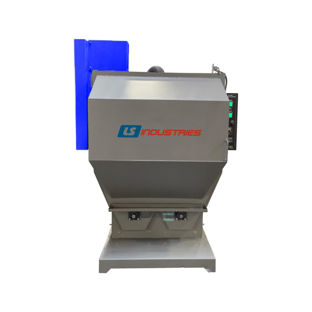 Closed-lid tumble blaster industrial machine with a sealed drum chamber used for cleaning and surface finishing metal parts.