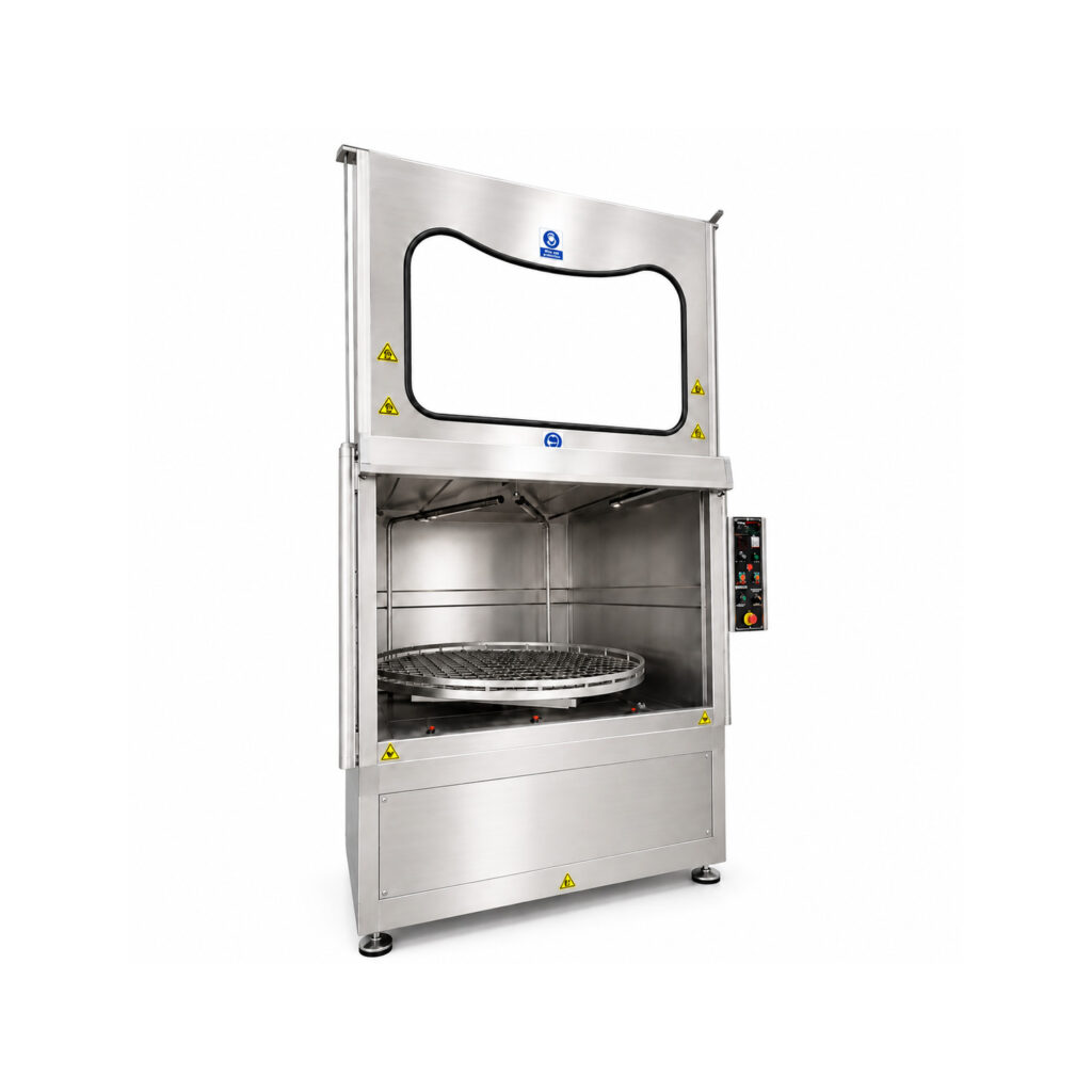 Angled view of a stainless steel industrial washer featuring corrosion-resistant construction, enclosed wash chamber, and automated cleaning system for precision part washing.