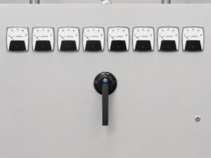 Ammeters mounted on a propane tank blaster control panel used to monitor motor current draw and system operating performance.