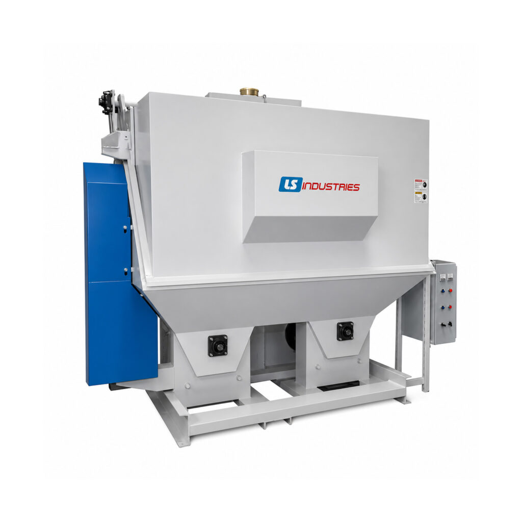 Angled view of a fixed basket blaster designed to clean and prepare parts secured in a rotating basket using high-velocity abrasive blasting.