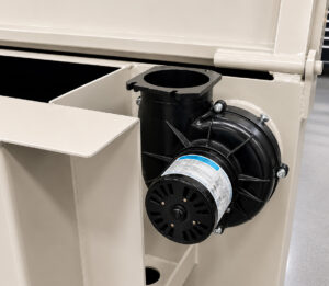 Industrial blower motor on a dip tank system providing airflow for drying, ventilation, vapor removal, or solution agitation during processing operations.