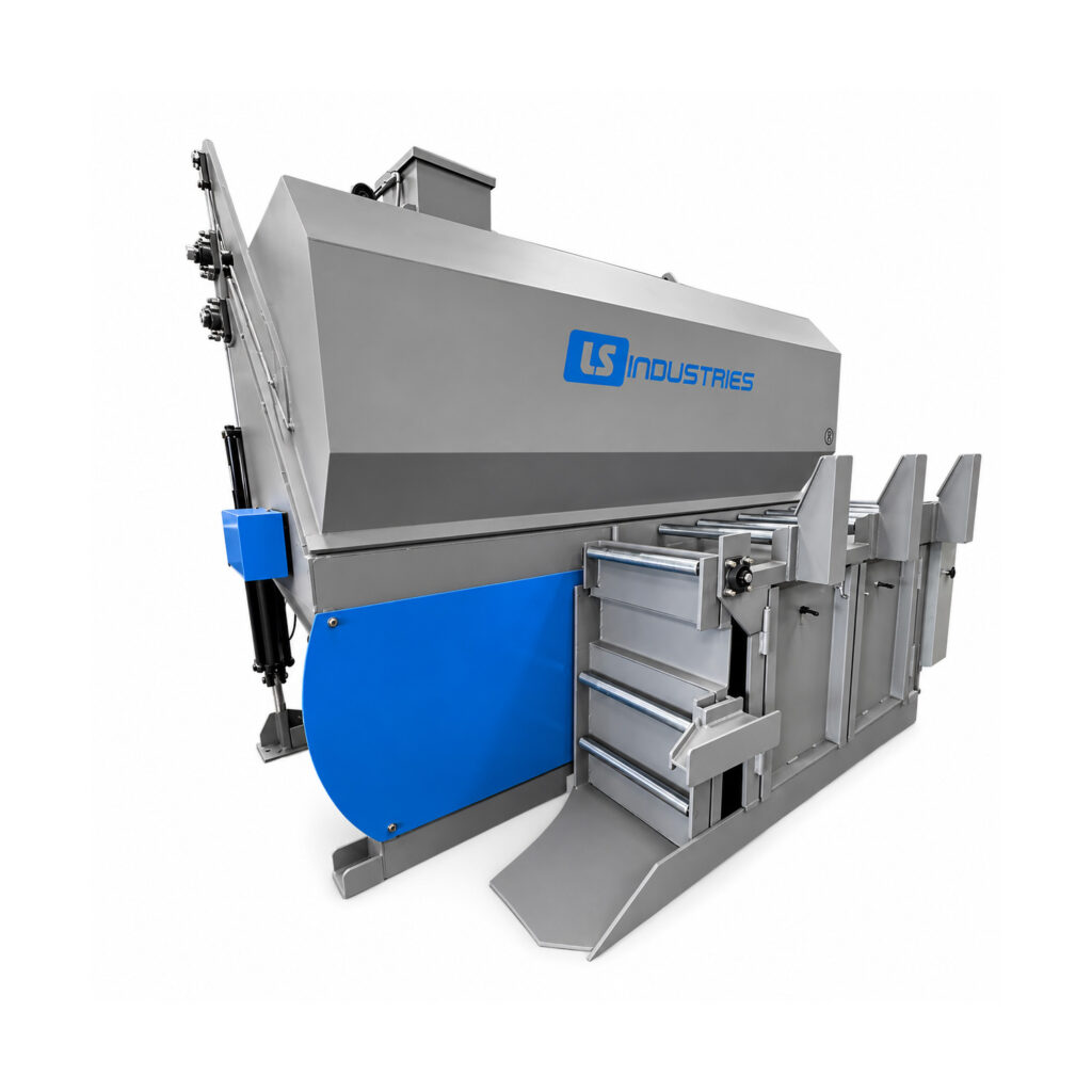 Angled view of a batch cylinder shot blaster used for abrasive cleaning and surface preparation of cylinders in a batch processing system.