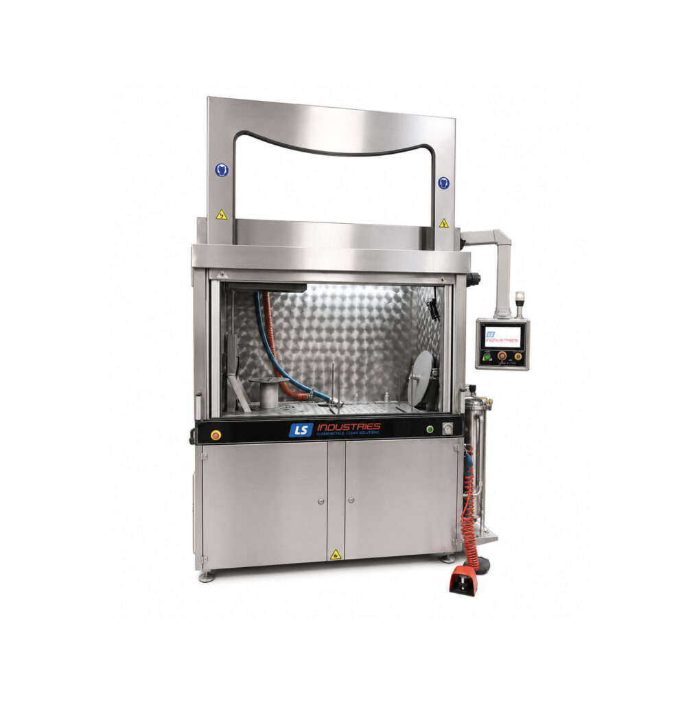Angle view of an LS Industries Diesel Particulate Filter Washer (DPFX) designed for cleaning diesel particulate filters, featuring a fully enclosed wash chamber, integrated filtration system, and heavy-duty industrial construction.