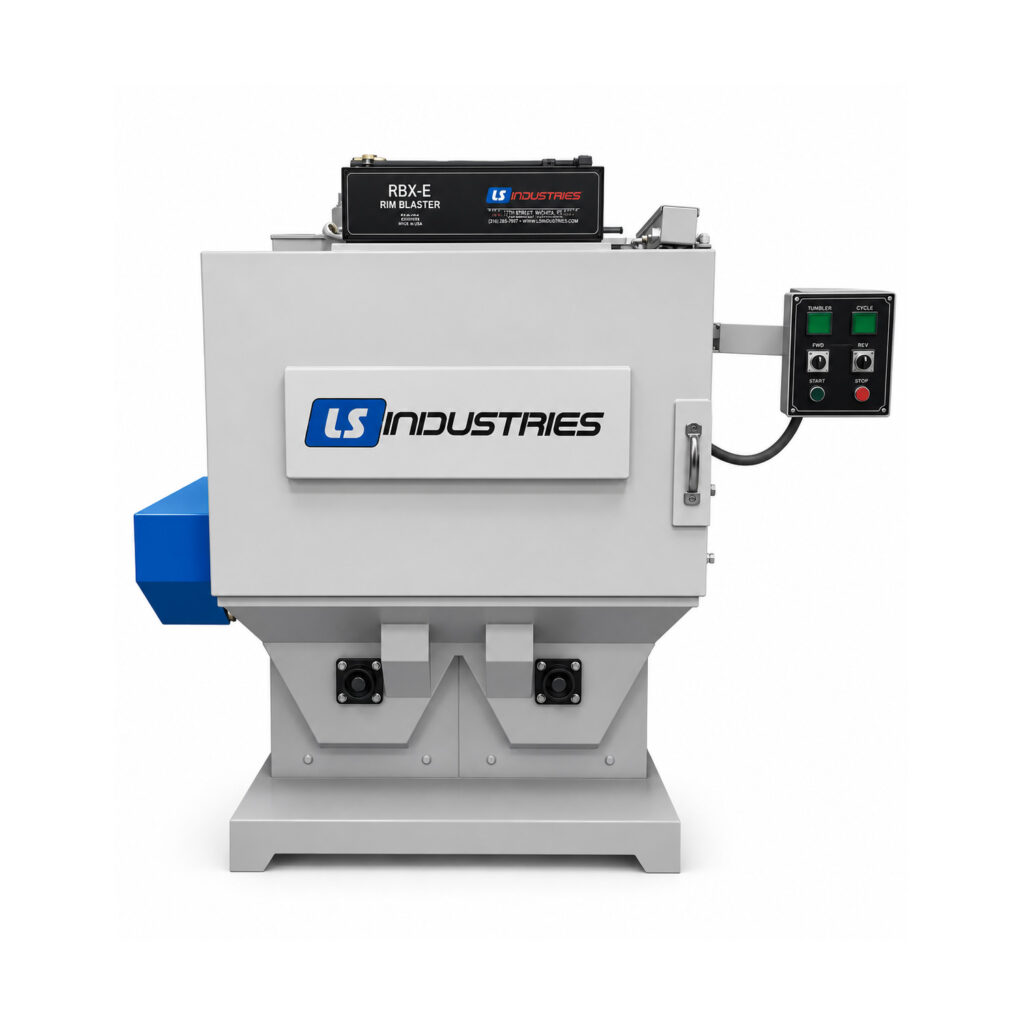 Angled view of a wheel rim blaster designed to clean and prepare steel wheels, rims, and similar circular components using automated abrasive blasting.
