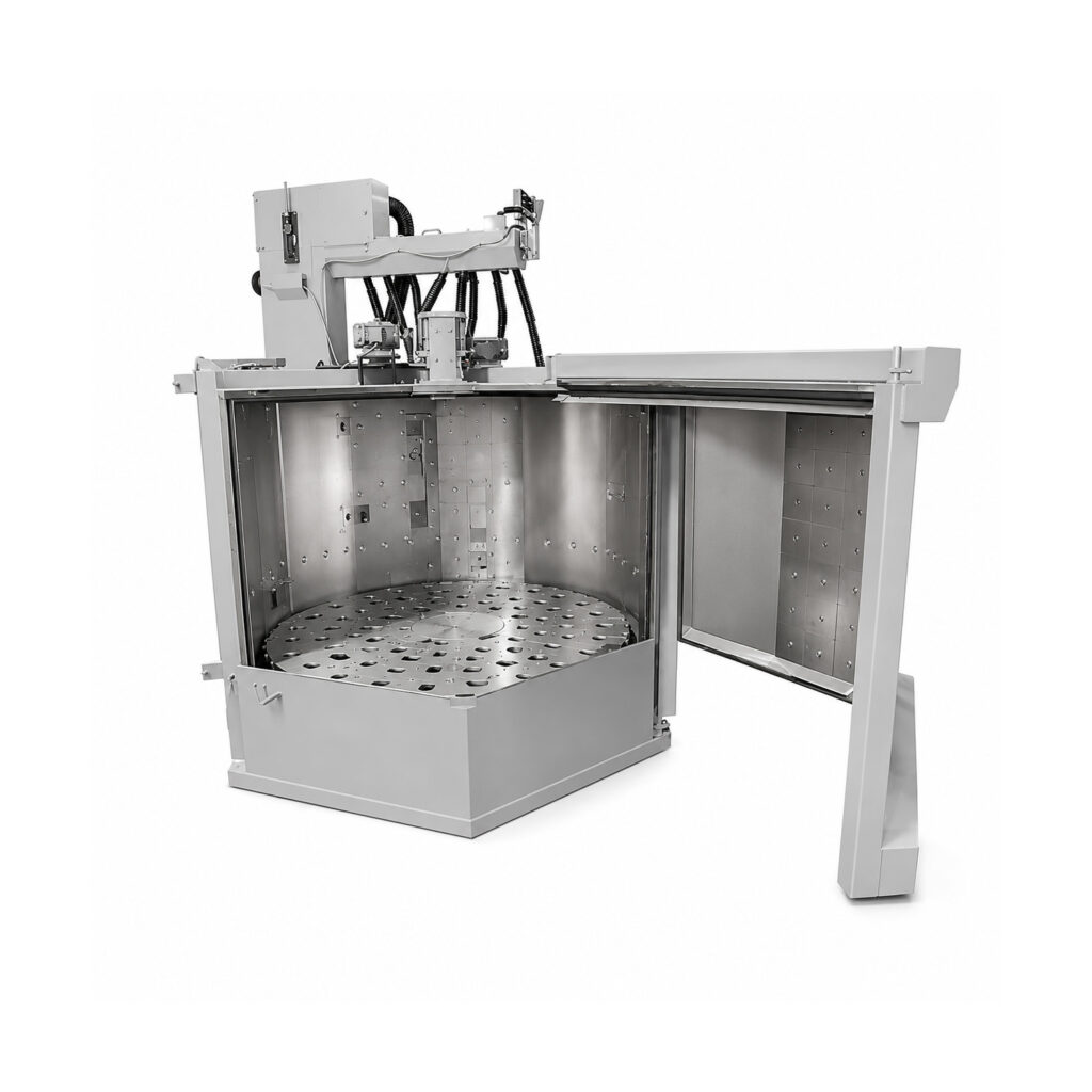Angled view of a table blaster designed to clean and prepare large, heavy, or irregularly shaped parts using abrasive blasting on a rotating worktable.