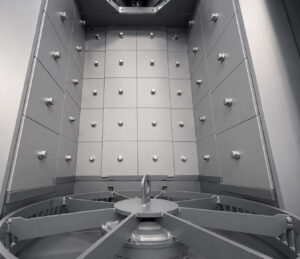 Heavy-duty rotating turntable inside a table blaster used to slowly rotate parts through the blast pattern for complete surface coverage.