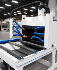 Angled view of a roller conveyor automation and handling system designed to transport parts and materials efficiently between production processes.