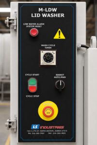 Control panel of an LS Industries Drum Lid Washer featuring operator controls for managing wash cycles, system functions, and machine operation.
