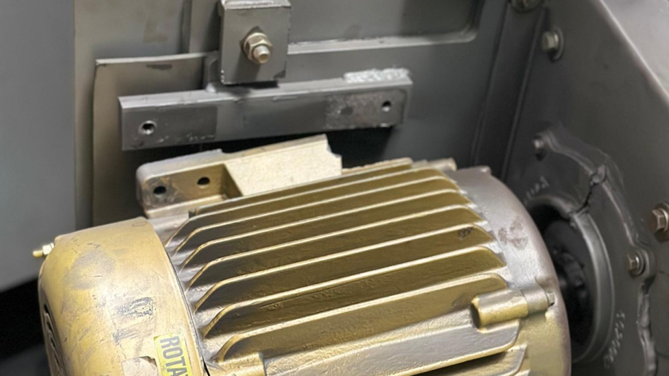 Damaged industrial blast wheel showing worn, chipped, or broken blades and internal components used in abrasive blasting systems for surface preparation.