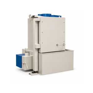 Angled view of a compact rotary table washer designed for cleaning small to medium-sized parts using a rotating turntable and high-pressure spray system.