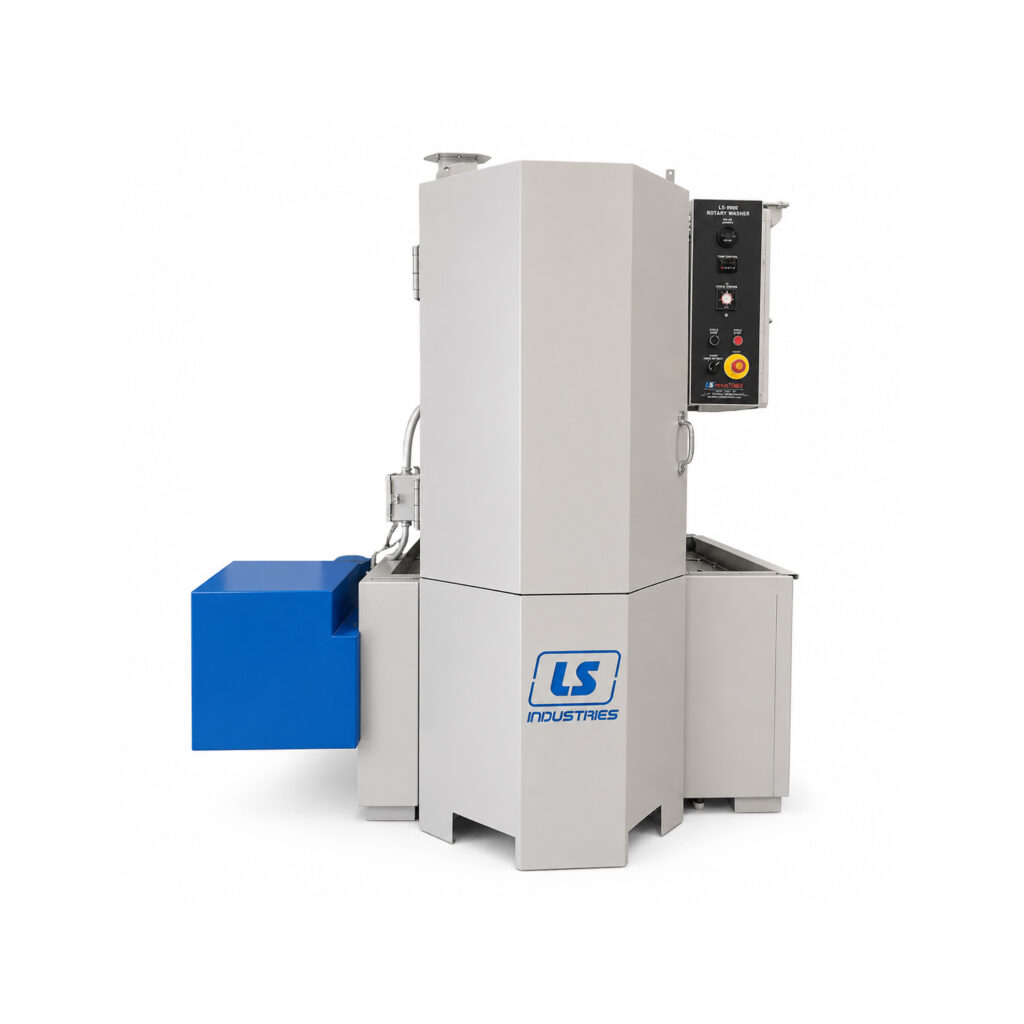 Angled view of a compact industrial table washer featuring a rotating worktable and enclosed wash chamber designed for cleaning small to medium-sized parts.