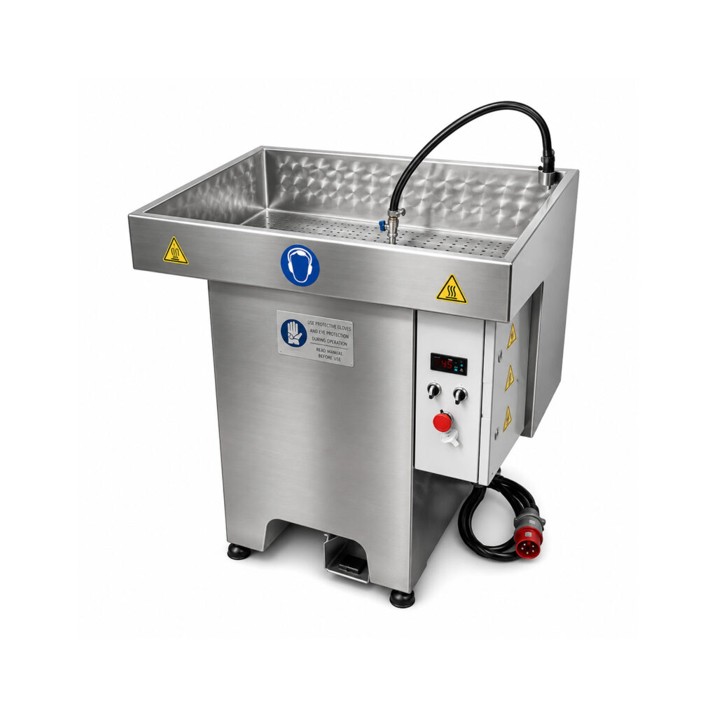 Angled view of a manual spray washer featuring an open cleaning station where operators use a spray wand to remove grease, oil, dirt, and contaminants from parts.