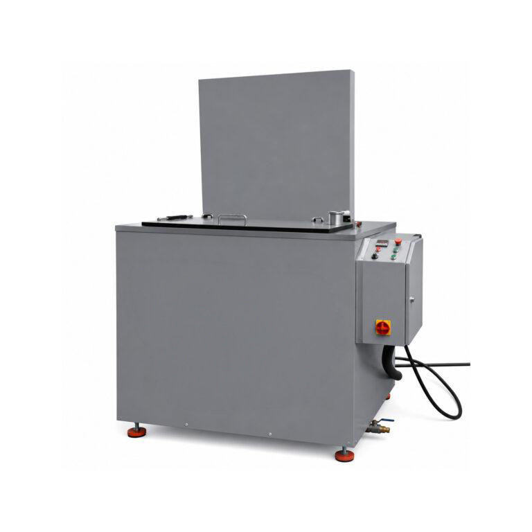 Angle view of an LS Industries Agitation Washer designed to clean industrial components using heated cleaning solution and agitation for effective contaminant removal.
